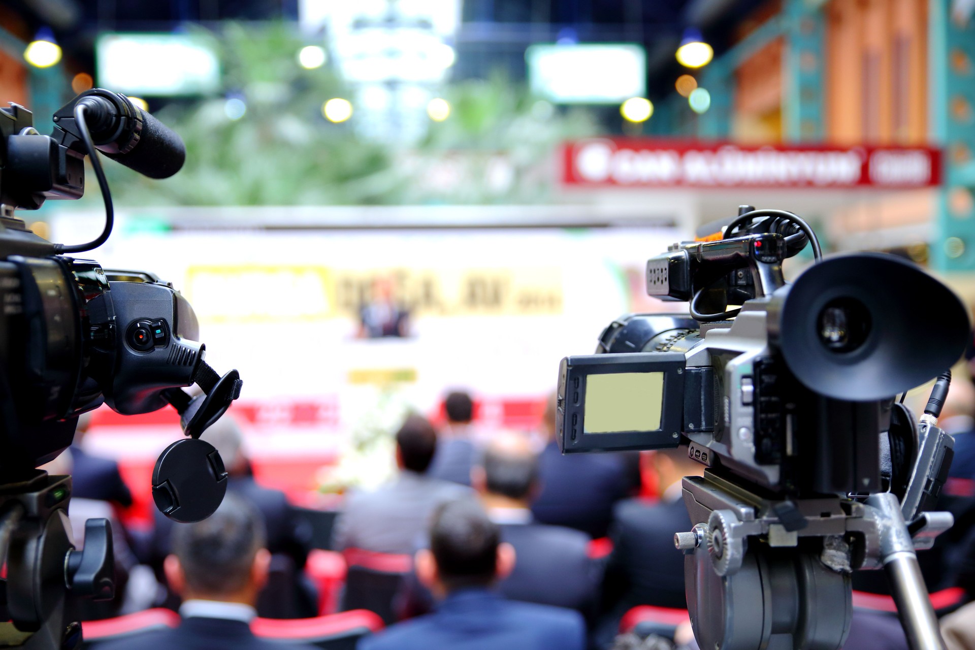 Close-up shot cameras at press conference